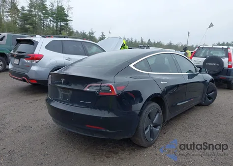 2018 Tesla Model 3 Long Range/Performance z USA, uszkodzony, nr VIN 5YJ3E1EB3JF064096